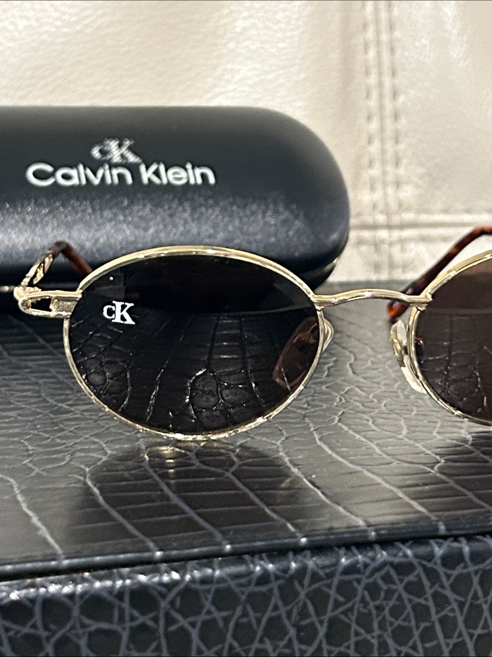 Calvin Klein Vintage 1990’s Oval Sunglasses With black lens and cK Logo